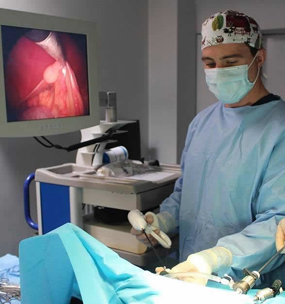 Phil Owen doing laparoscopic surgery
